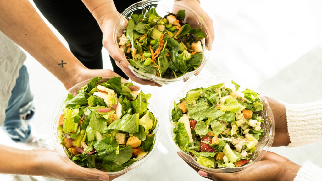 Photo of three healthy salad bowls