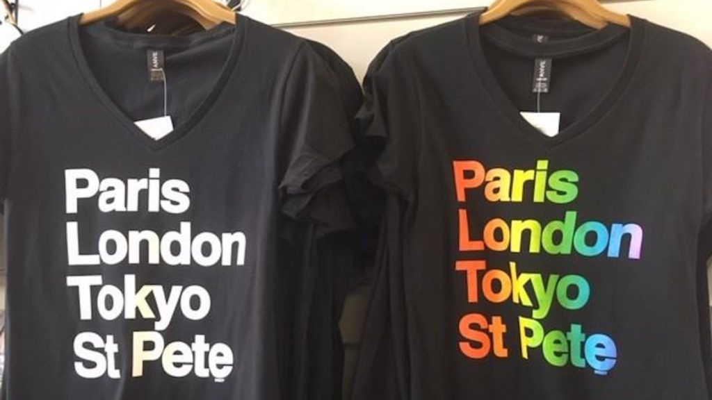 Photo of shirts that read "Paris, London, Tokyo, St. Pete."