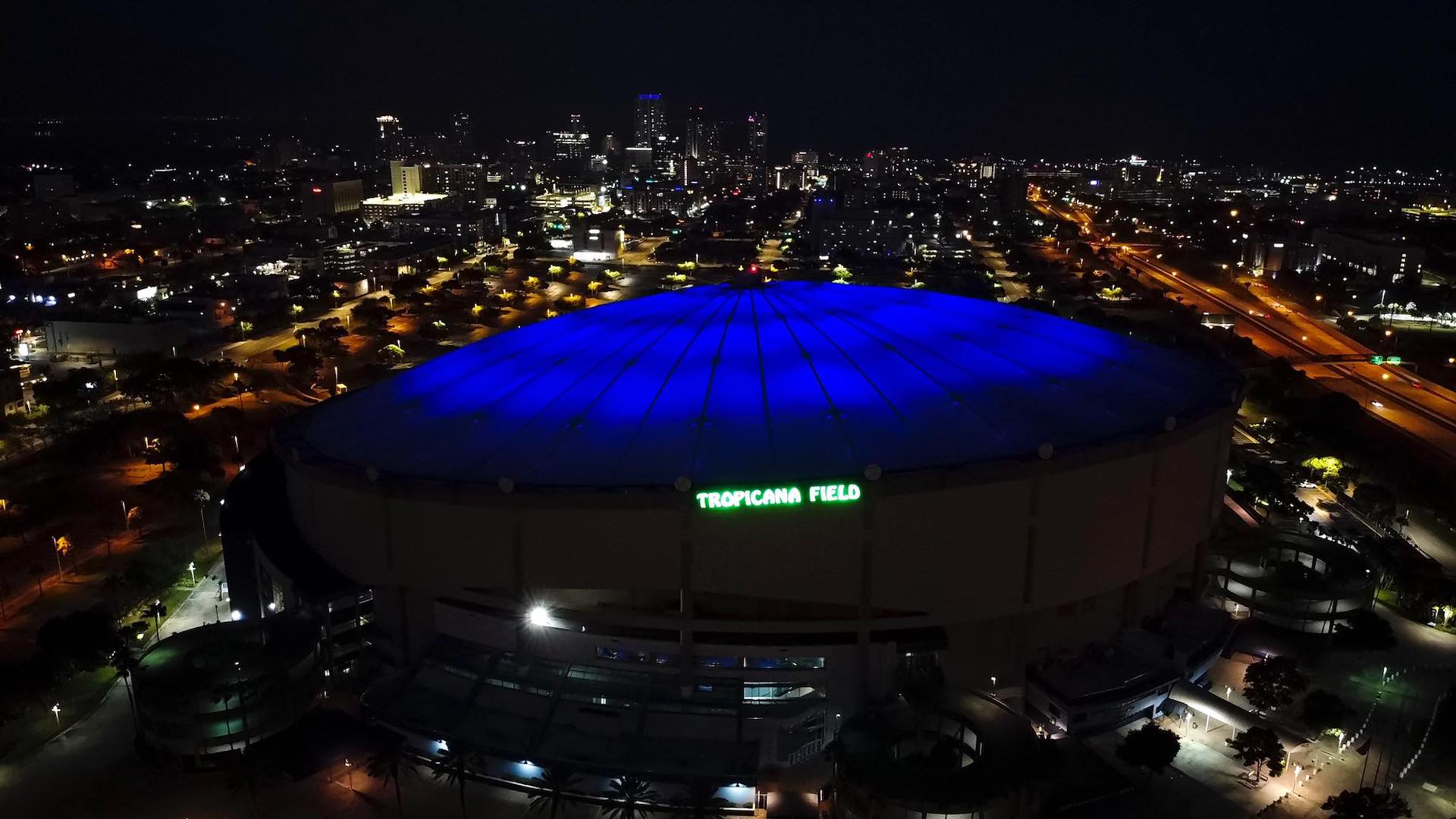 Tropicana Field lights up in blue to honor first responders