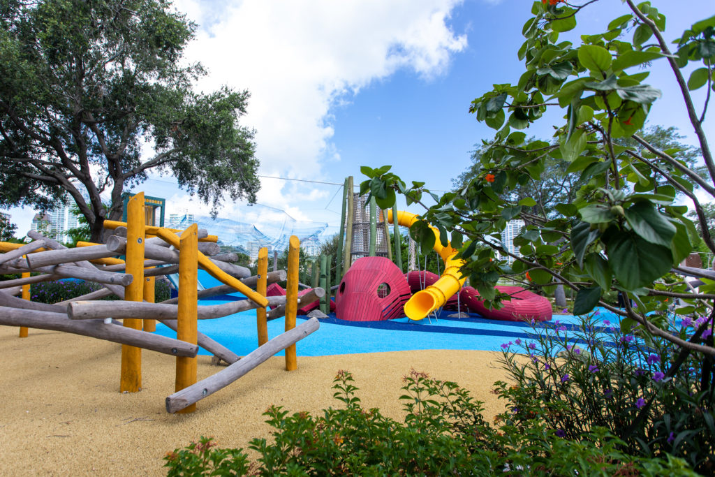 Photo of a waterfront playground with an octopus slide