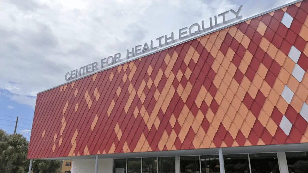 Exterior of large building with word "Center for Health Equity" on top