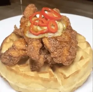 Photo of fluffy waffles and fried chicken