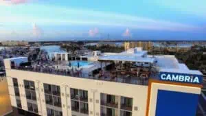 Aerial view of a rooftop bar and hotel on the Gulf Coast