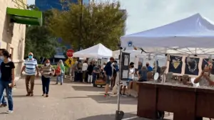 Outside an art market taking place in a parking lot