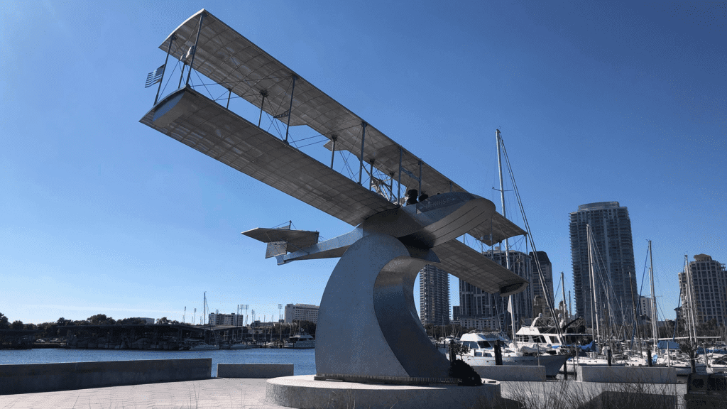 Sculpture of a small seaplane on the waterfront