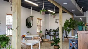 interior of a dessert shop with a swing at the center