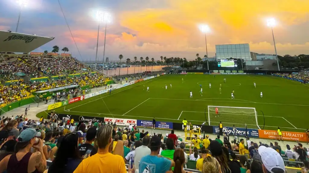 Al Lang stadium during a soccer match at sunset