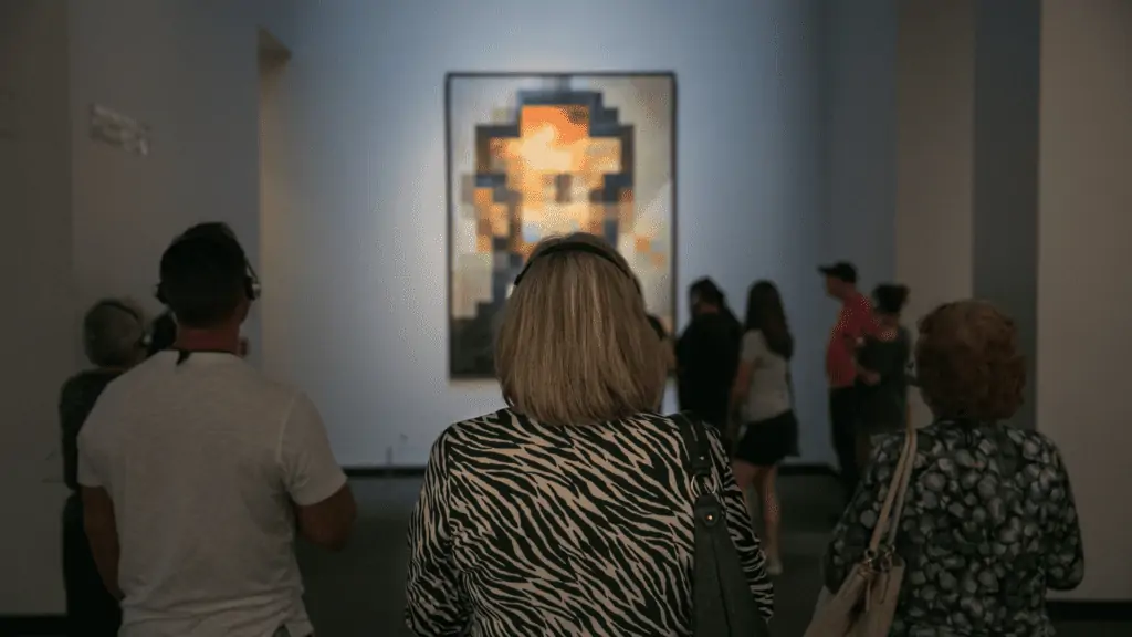 Guests viewing a Dali painting