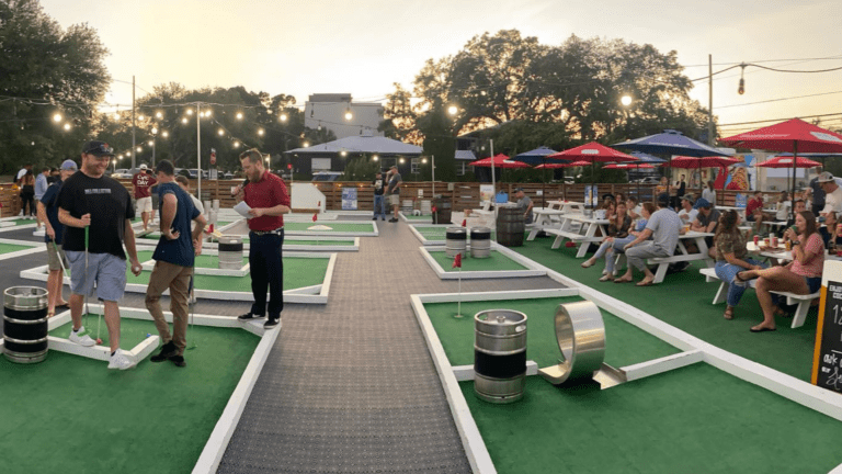 People playing mini golf at Par Bar