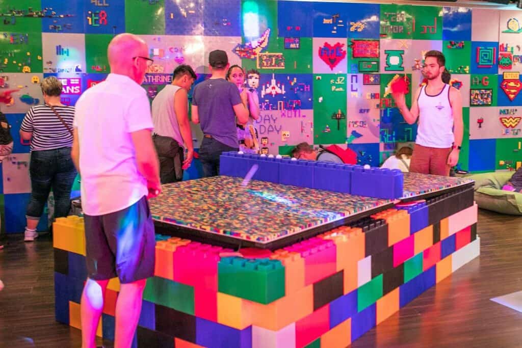 Inside a colorful bar made entirely of colorful bricks
