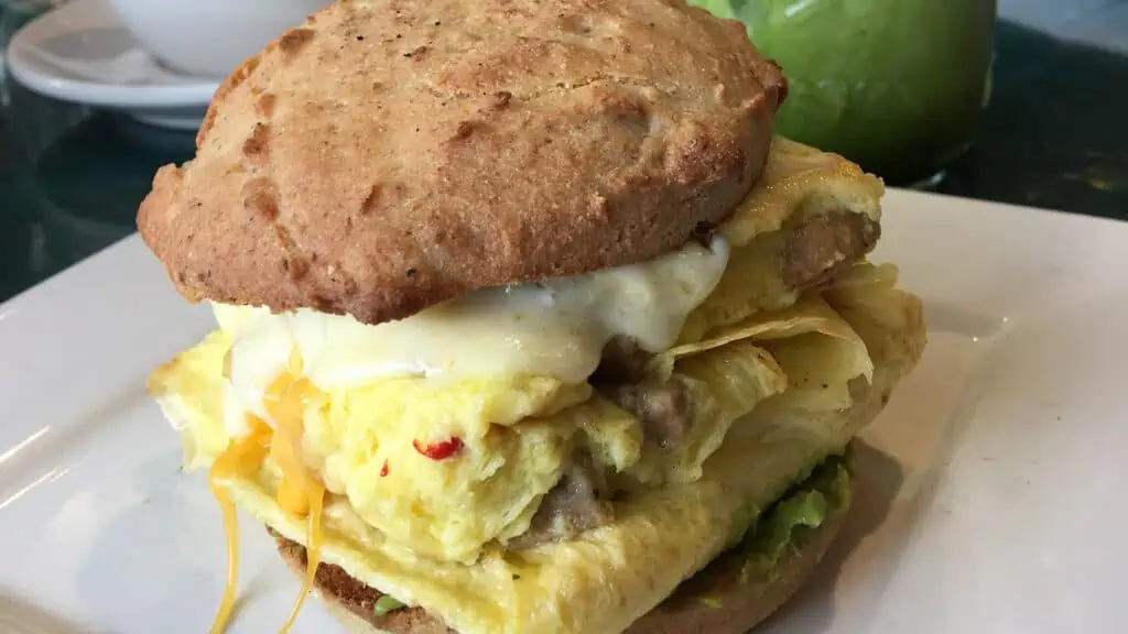 an egg and sausage and cheese glutenfree sandwich from craft kafe