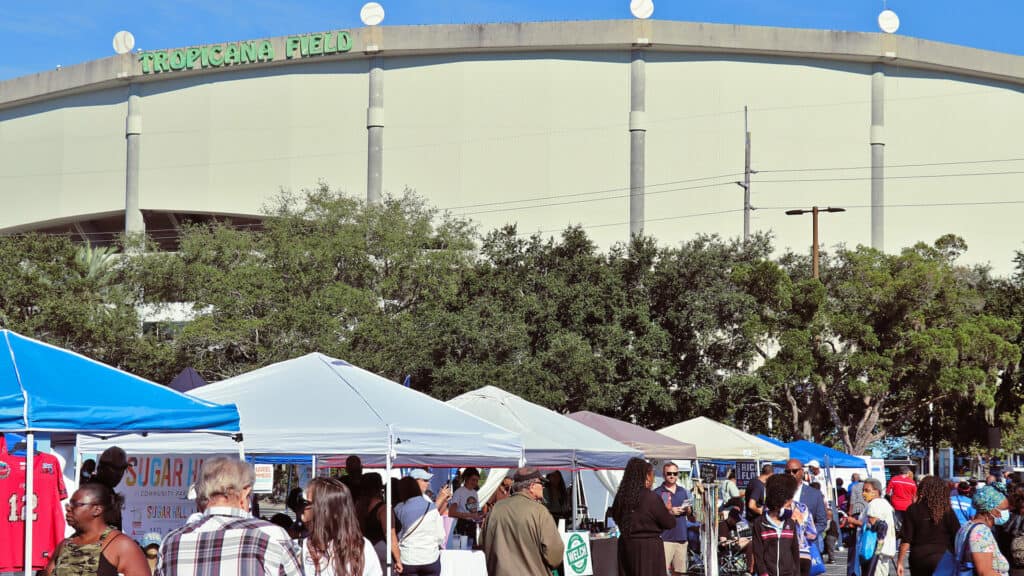 exterior of a baseball stadium with vendors outside