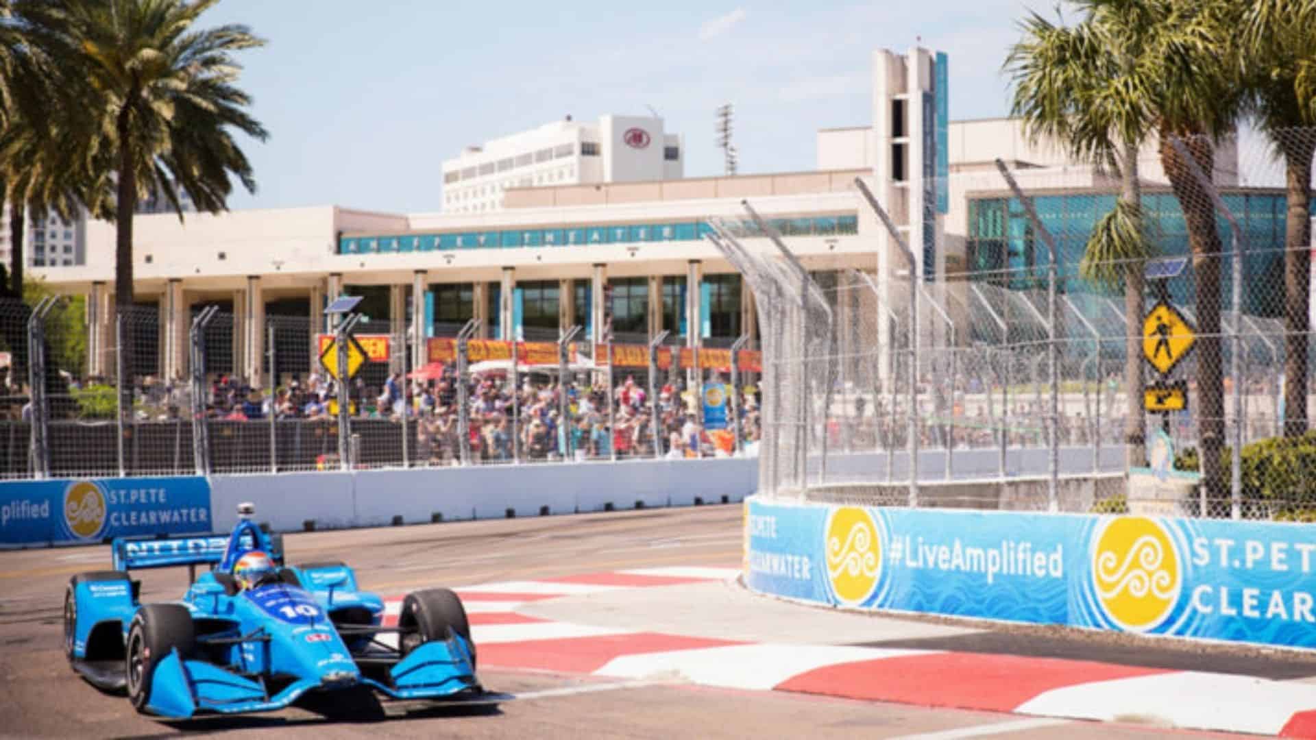 A car making a turn at the Grand Prix