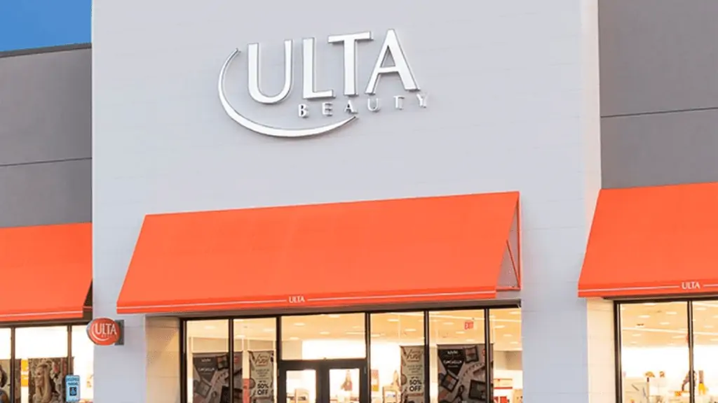 Exterior of a beauty store with a small orange awning over the front door