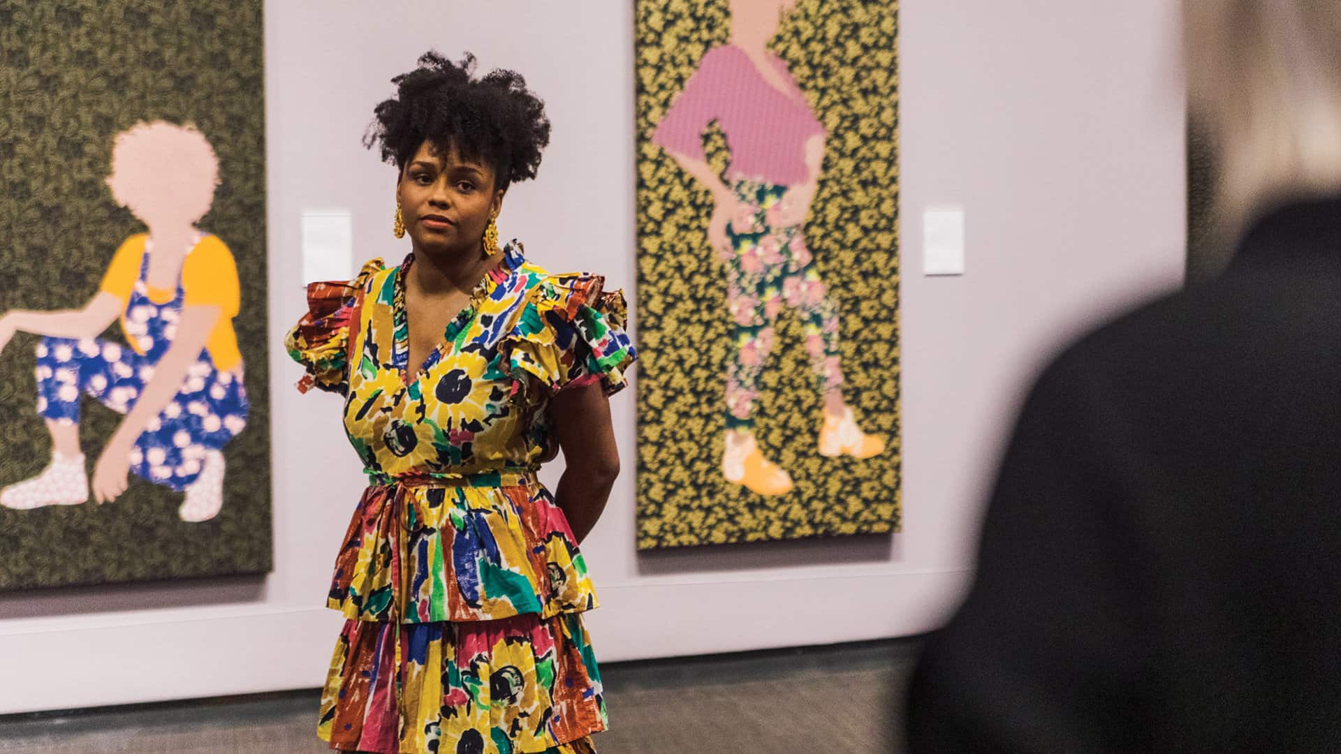 Artist Gio Swaby in front of her work at the Museum of Fine Arts