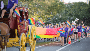 A carriage and participants in the Pride Parade