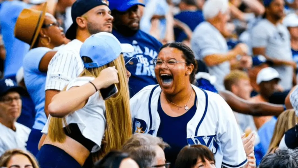 Young fans cheering at a Rays game