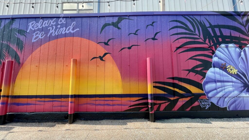 A sunset mural by the Vitale Bros