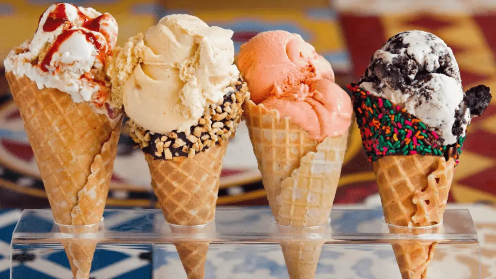Four ice cream cones with different flavors