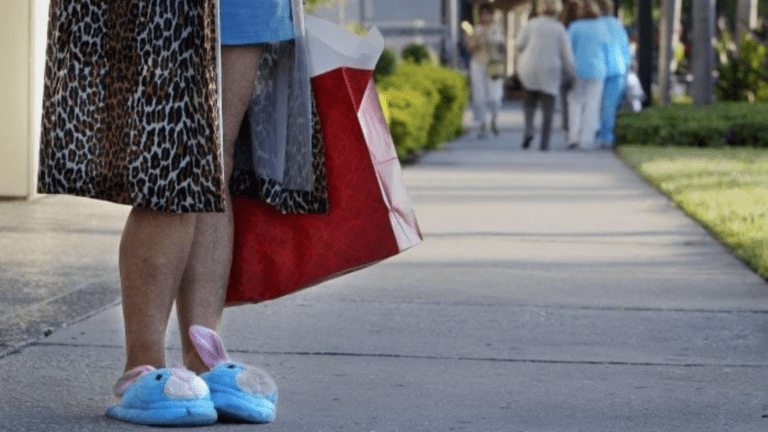 A shopper in pajamas at Sunrise Sale