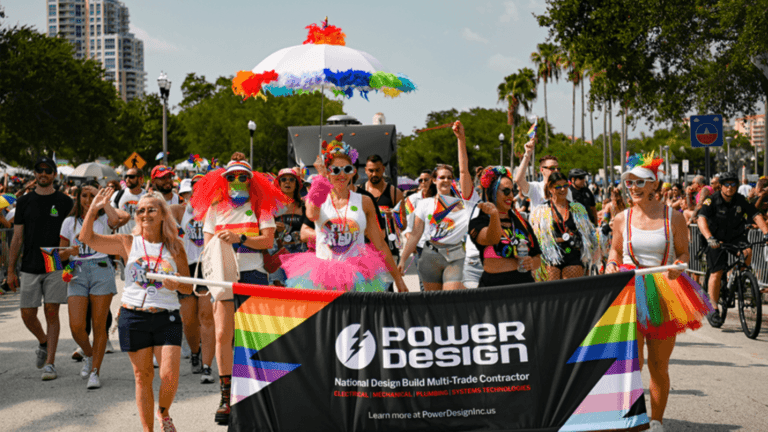 A group of Power Design employees in the St. Pete Pride parade