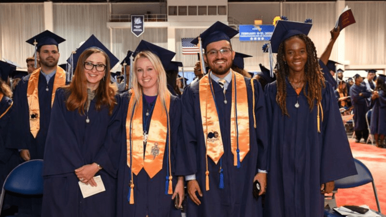 A group of Tampa Bay graduates at graduation