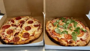 Two of Nino's Pizza truck's pizzas