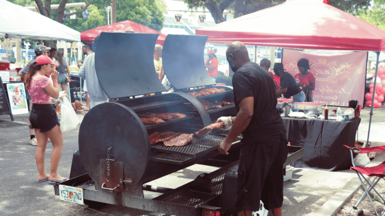 A man working the grill at Saturday Morning Shoppe
