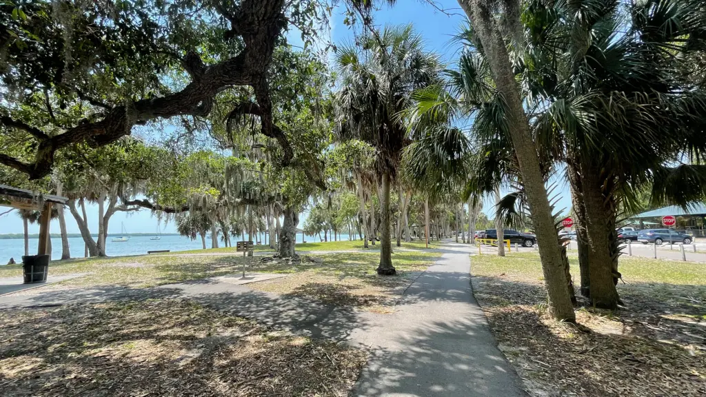 a waterfront park with a long walkway