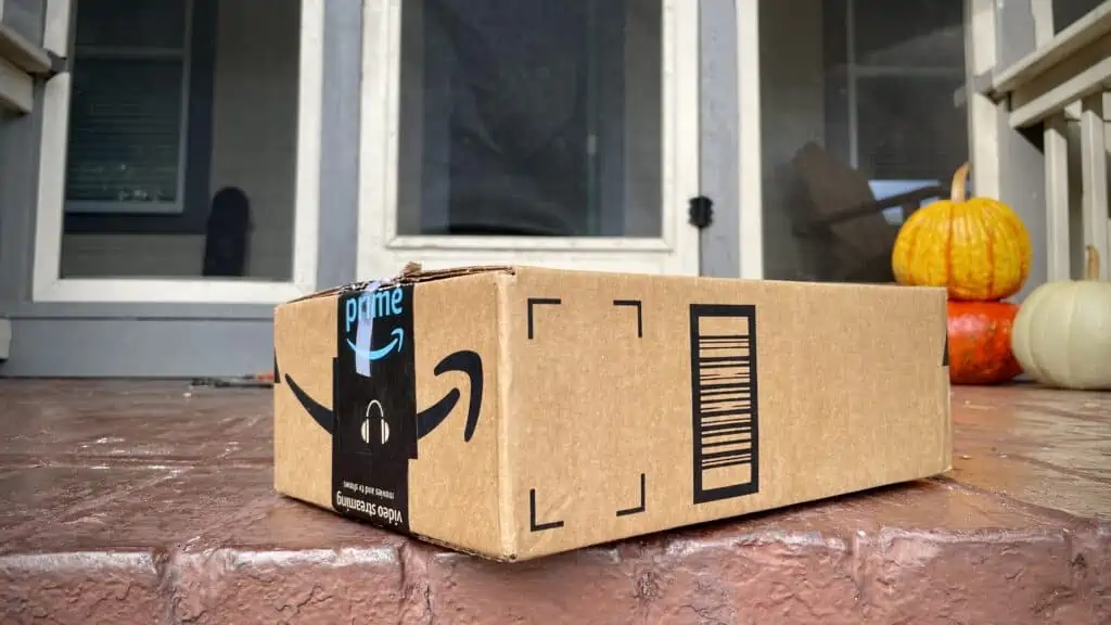 An Amazon box on a door step