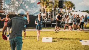 People playing cornhole