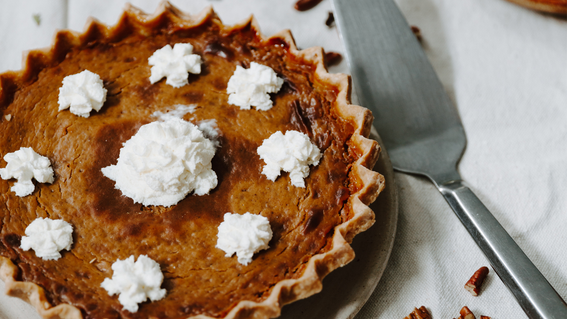 a pie topped with whipped cream from craft kafe