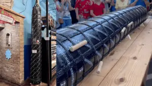 large block of cheese outside Mazzaro's Italian Grocer