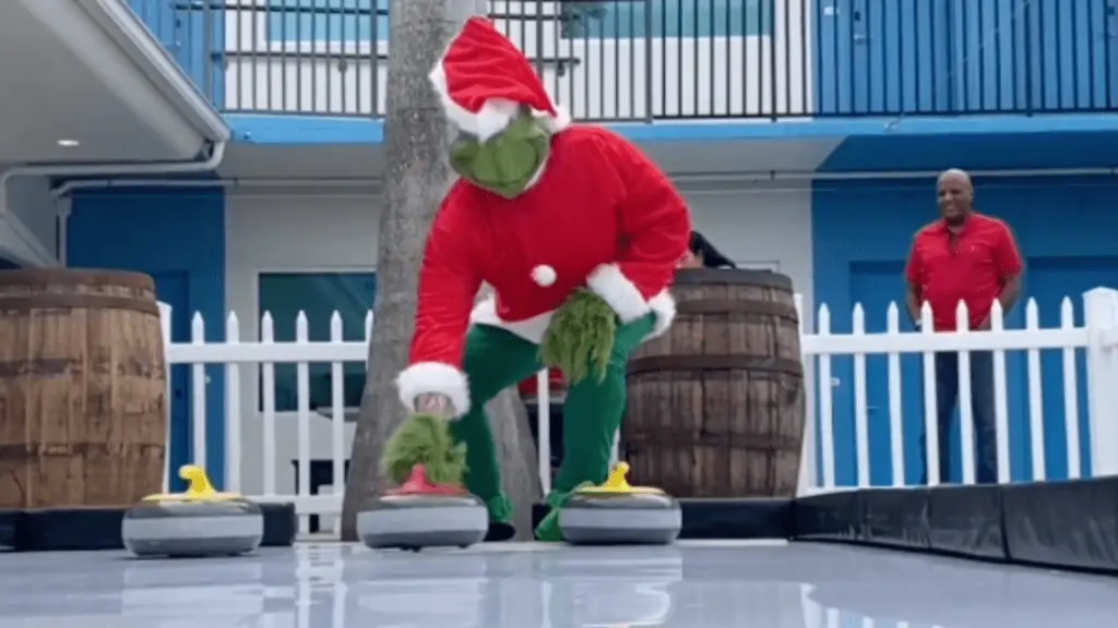 The Grinch ice curling on the beach