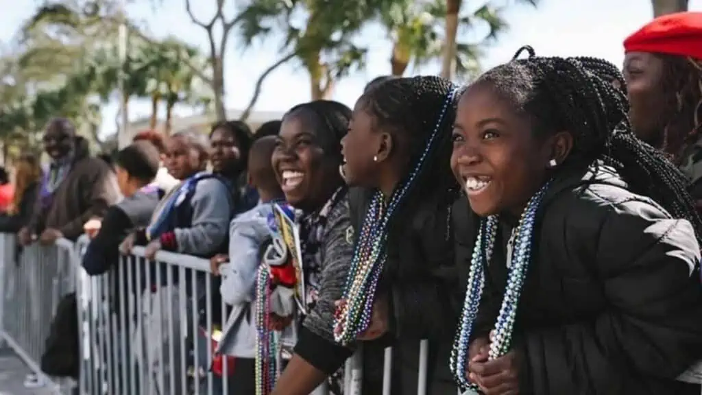Parade-goers smiling on MLK Day
