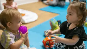 Two children playing at The Barn