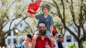 a father and son at the grand prix