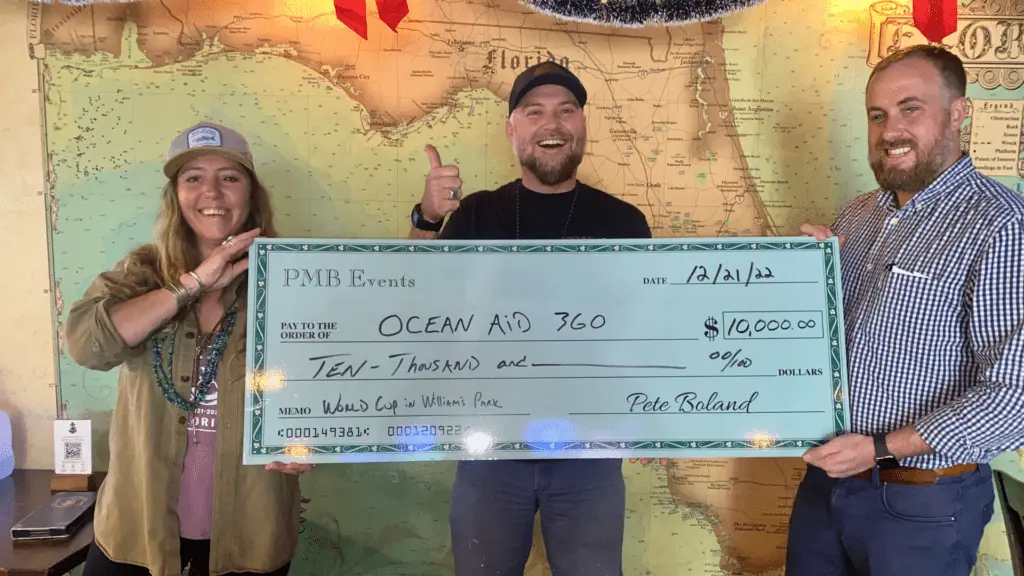 A check being presented to Ocean Aid 360