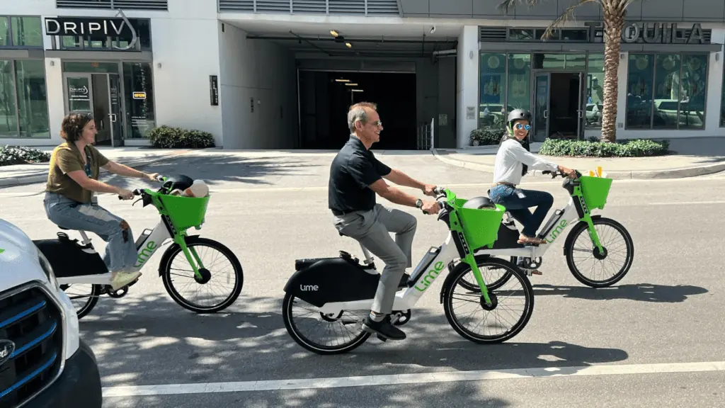 People riding Lime bikes
