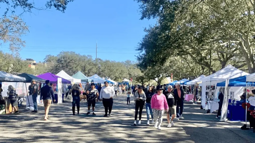 A crowd of people at a food festival