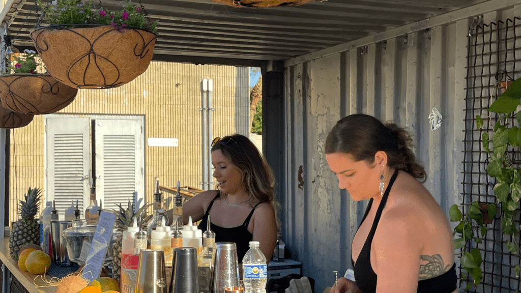 Bartenders pouring drinks at St. Petersburg Distillery