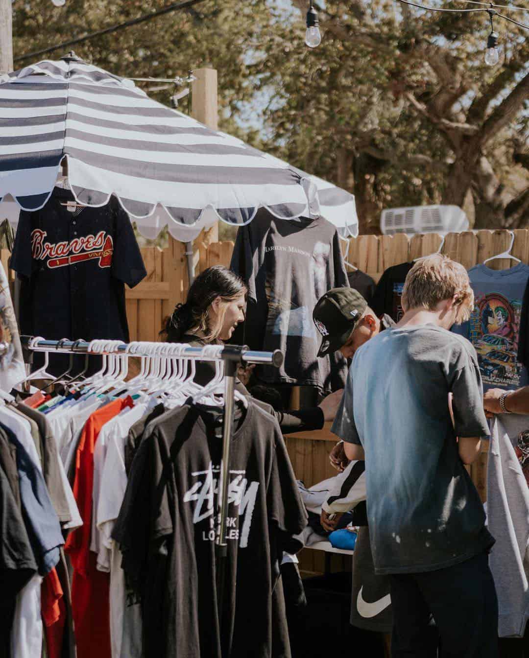 People at a thrift market outside