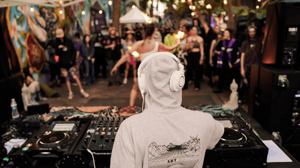 A DJ performing at Sacred Sessions