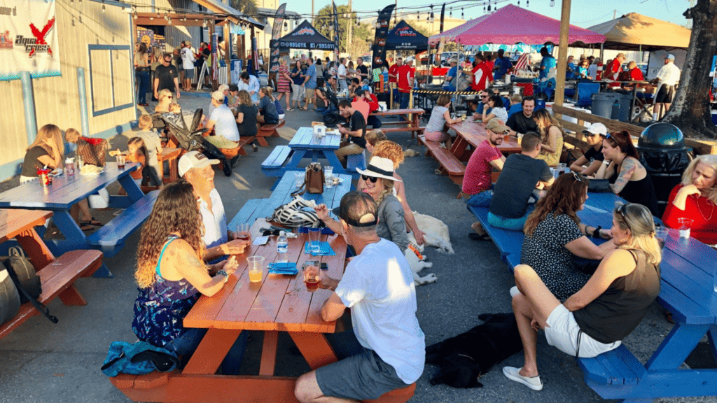 People eating and drinking at 3 Daughters Brewing