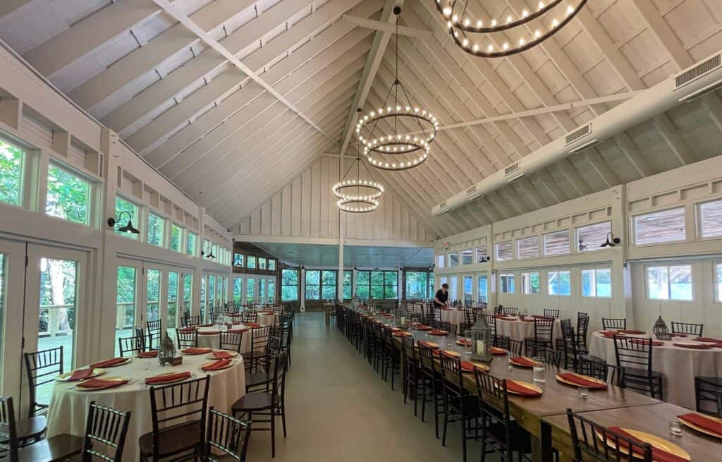 interior of a wedding venue with tables set for 200 guests