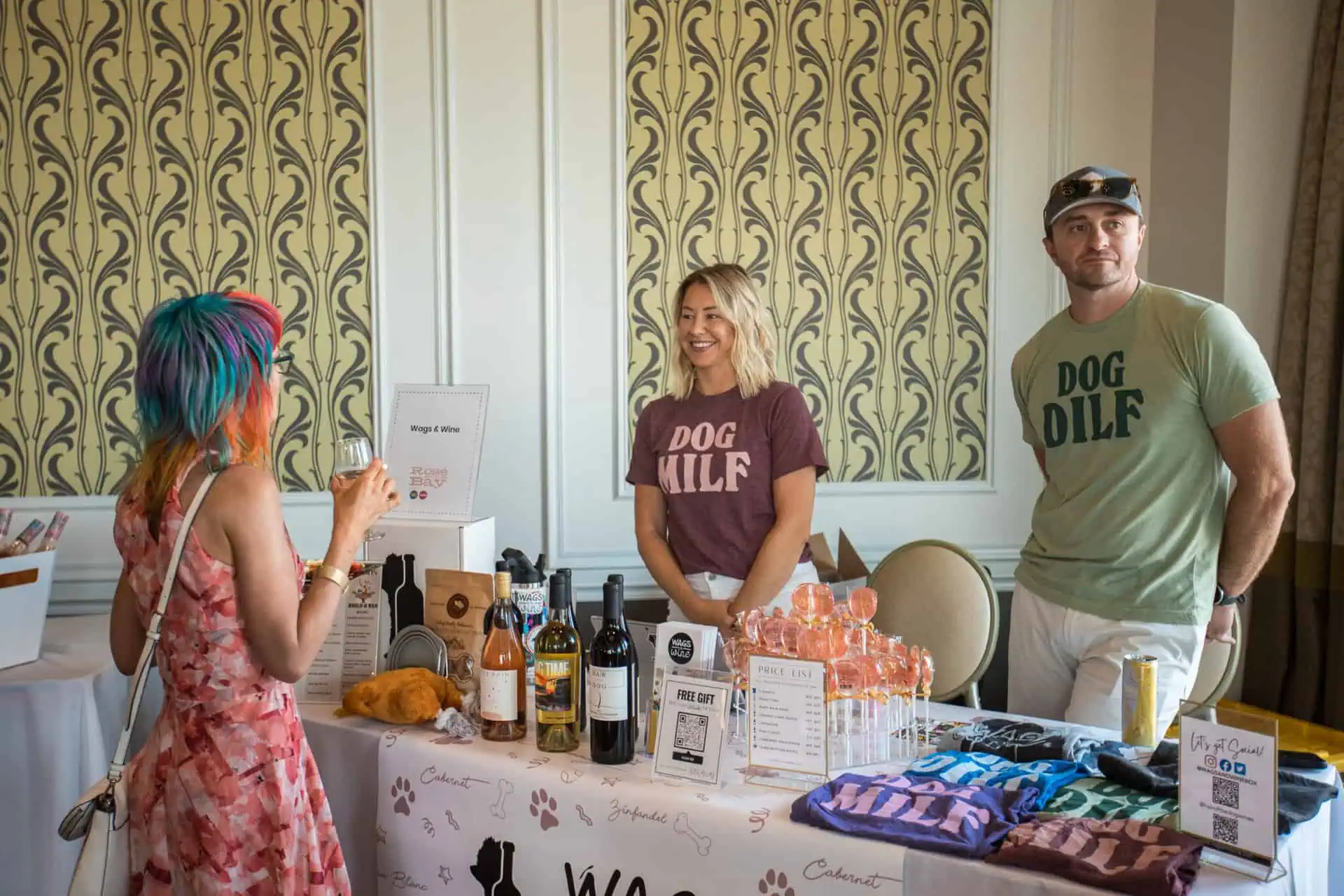Wags and Wine talks about their products with a guest