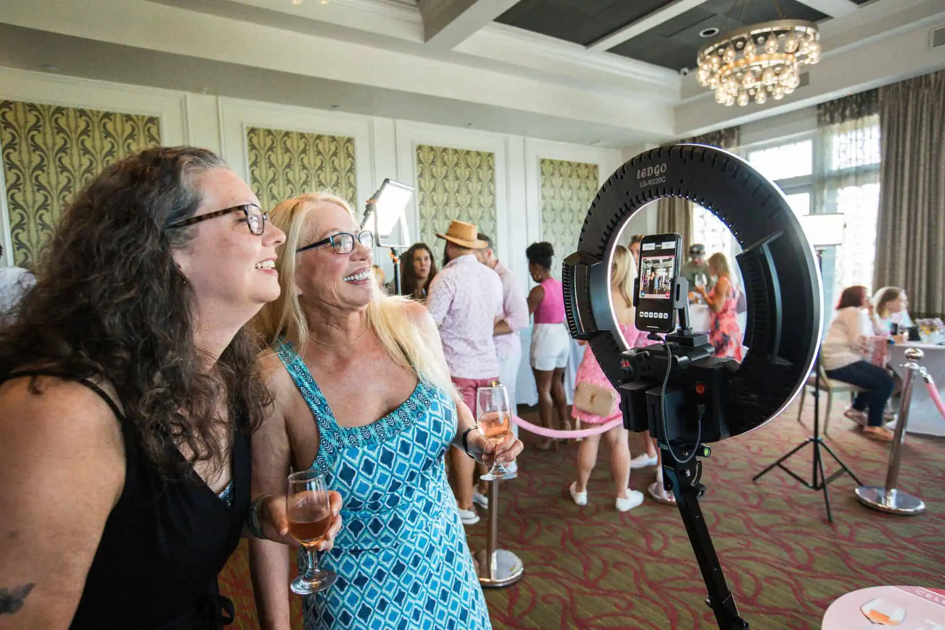 friends using the 360 camera setup at rose by the bay