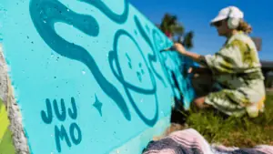 An artist working on a mural