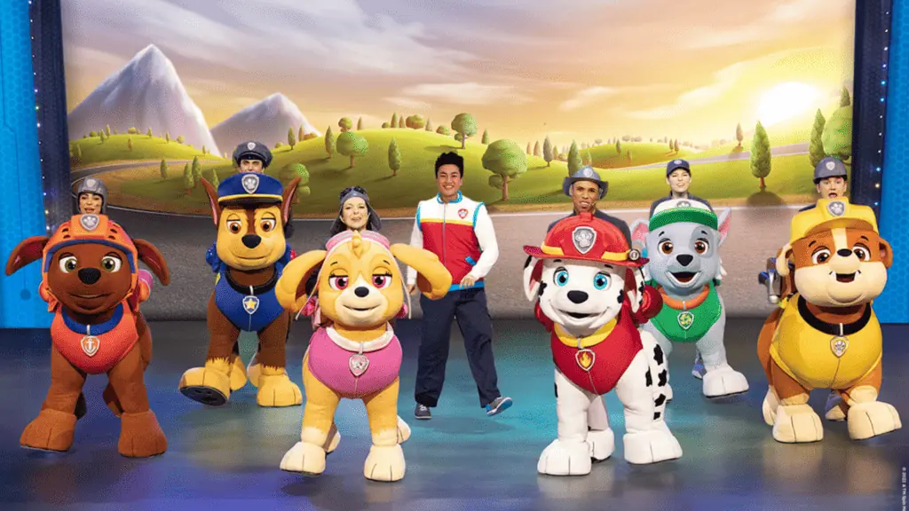 The PAW Patrol cast posing on stage