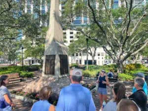 Monica Kile talks to a tour group at Pioneer Park